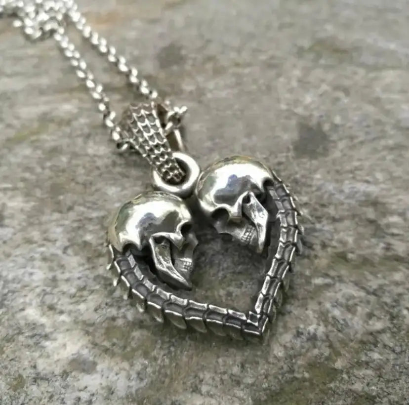 Double Skull Heart Pendant